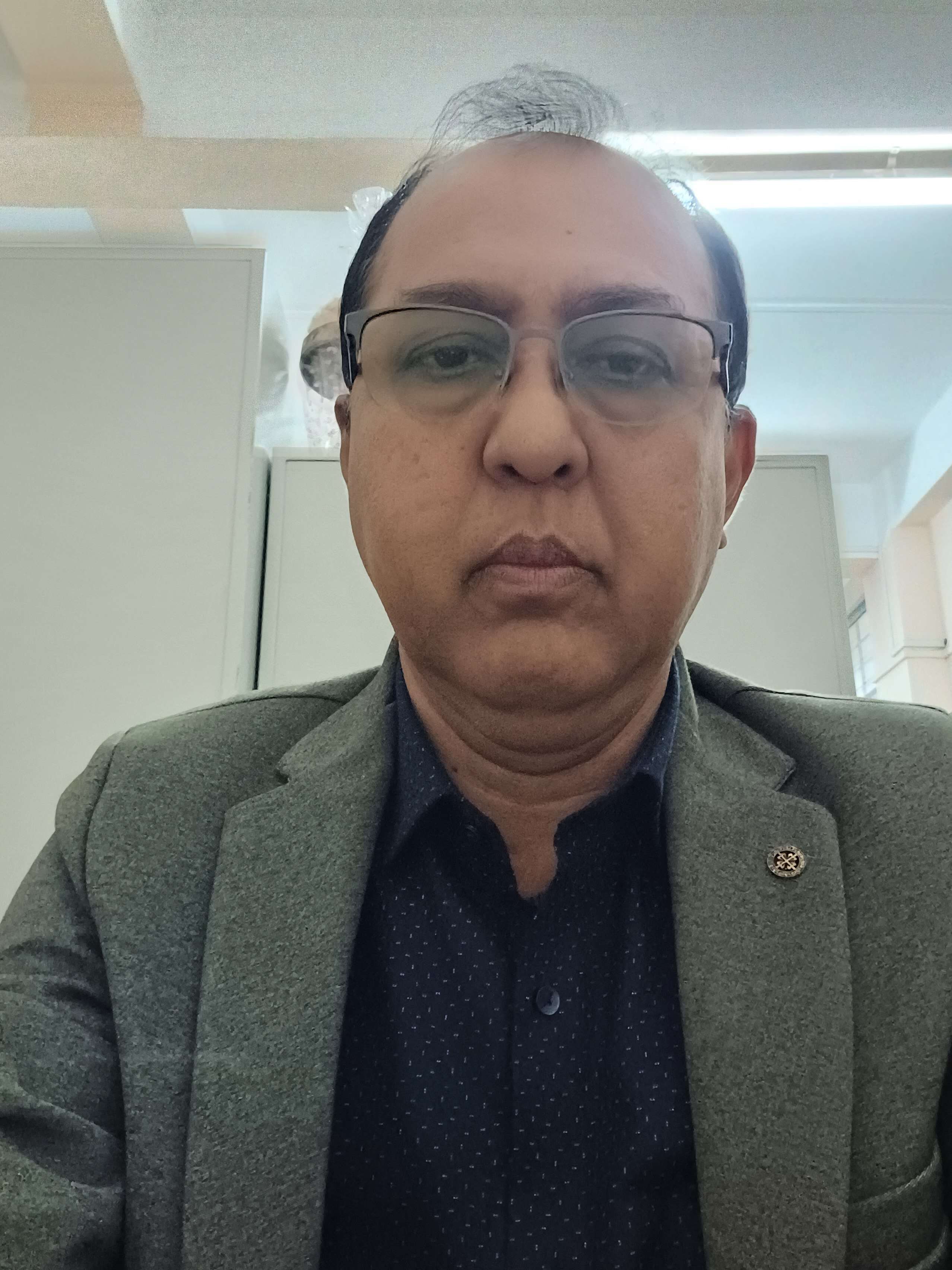 Professor Dulumoni Goswami